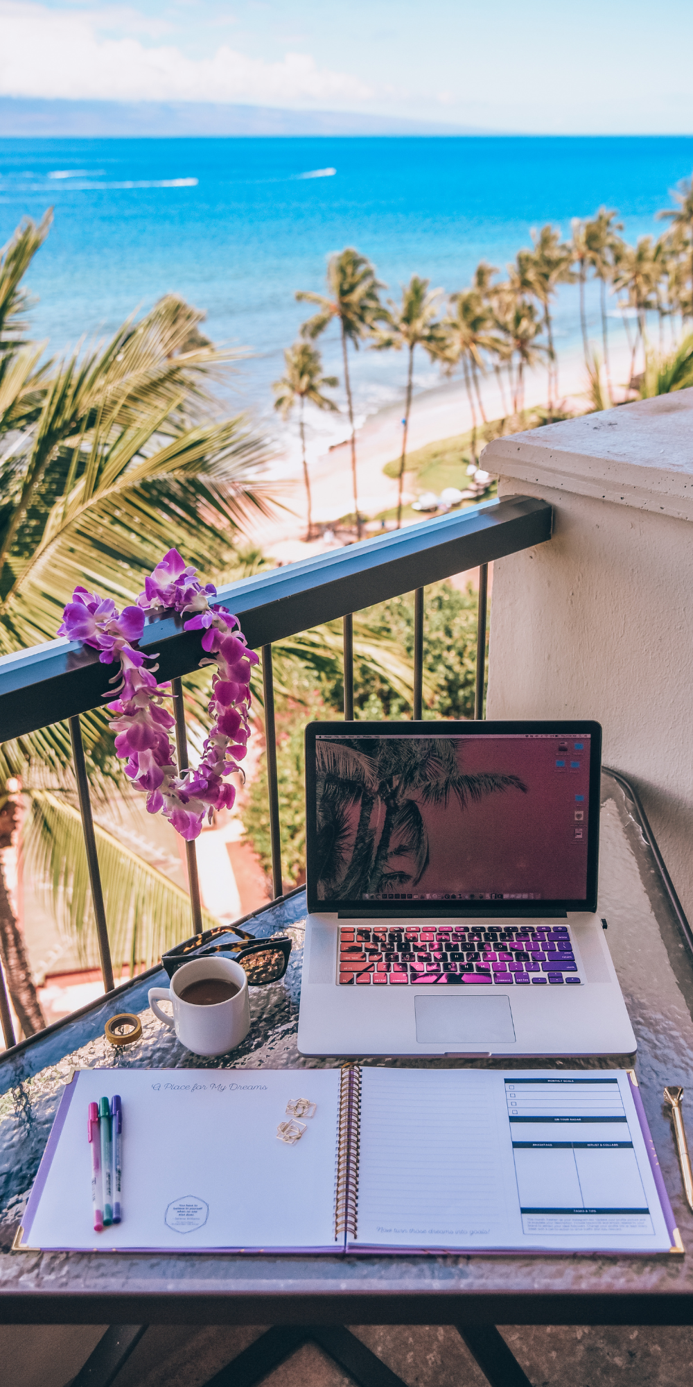 person typing on MacBook Pro on brown wooden table during daytime photo